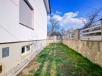 Außenansicht - Attraktive 3‑Zimmer-​Wohnung mit Gemeinschaftsgarten und Parkplatz