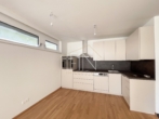 Küche - Erstbezug! 2‑Zimmer Gartenwohnung mit Garagenplatz und Gemeinschaftsdachterrasse