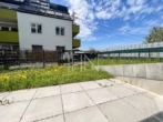 Garten mit Terrasse - Erstbezug! 2‑Zimmer Gartenwohnung mit Garagenplatz und Gemeinschaftsdachterrasse