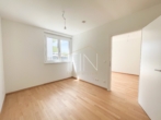 Schlafzimmer - Erstbezug! 2‑Zimmer Gartenwohnung mit Garagenplatz und Gemeinschaftsdachterrasse