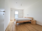 Schlafzimmer - Sonnige 2‑Zimmer Neubauwohnung mit Balkon & Fernblick