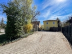 Parkplatz - Familientraum mit Garten – Sonniges Zuhause mit Charme