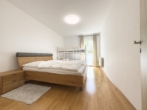 OG: Schlafzimmer 2 - Familientraum mit Garten – Sonniges Zuhause mit Charme