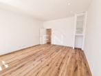 Wohnzimmer - Anleger aufgepasst! Stylische 1‑Zimmer-​Altbauwohnung im 3. Liftstock zu verkaufen – befristet vermietet!