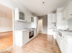 Küche - 4‑Zimmer-​Wohnung mit Balkon und Gemeinschaftsgarten
