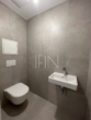 UG Toilette - Noble 3‑Zimmer Erstbezug Maisonett-Wohnung mit Garten, Balkon und Garage in Döblinger Bestlage