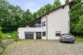 Hauptfassade, Hauseingang - Raum für das Familienleben – ein Zuhause mit Herz und Weitblick