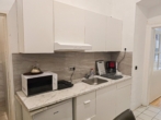 Küche - Kurzzeitvermietung erlaubt | 1‑Zimmer-​Apartment mit Beherbergungswidmung wird verkauft