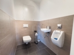 Toilette - Moderne, sonnige 3‑Zimmer-​Wohnung mit 50m² Dachterrasse