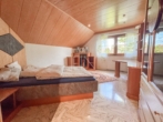 OG: Schlafzimmer 1 - Einfamilienhaus mit Pool, Wellness & großem Garten in Hennersdorf