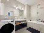 Badezimmer - Ihr Wohnglück im Grünen – Stylische 3‑Zimmer-​Wohnung mit Balkon!
