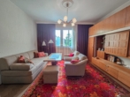 Wohnzimmer - Pärchentraum! 2‑Zimmer-​Wohnung mit Grünblick in Langenzersdorf zu verkaufen