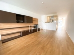 Wohnküche - Familienfreundliche 3‑Zimmer Wohnung mit Loggia zum Innenhof, Fitnessraum und Sauna!