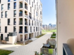 Ausblick Loggia - Familienfreundliche 3‑Zimmer Wohnung mit Loggia zum Innenhof, Fitnessraum und Sauna!