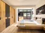 Schlafzimmer 1 - PRIVATE Lodges – TOP 1 – “Kamin Lodge”