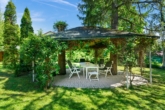 Garten, ostliche Seite des Grundstückes - Stil, Eleganz & Exklusivität vereint! Einzigartige Villa in Bestlage